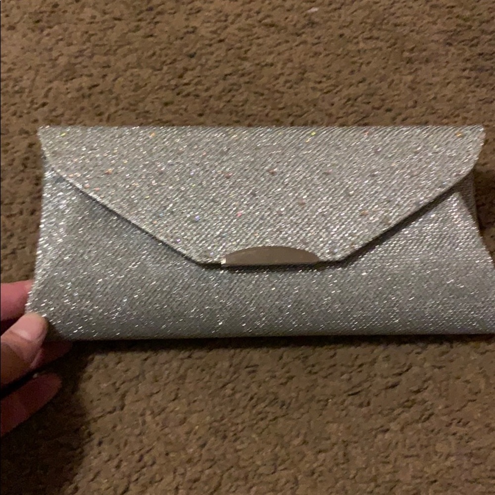 Silver clutch/ purse